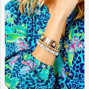 NWT and dust cover Strut your Stuff metallic gold